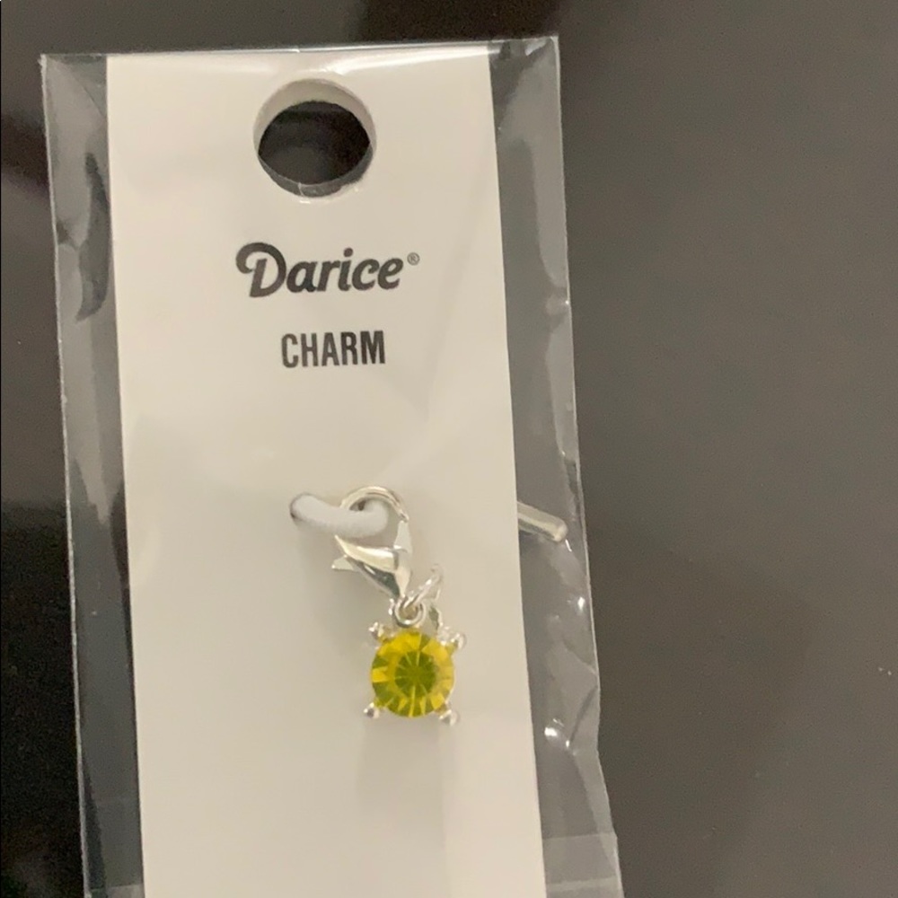 Darice Woman’s Charm.
